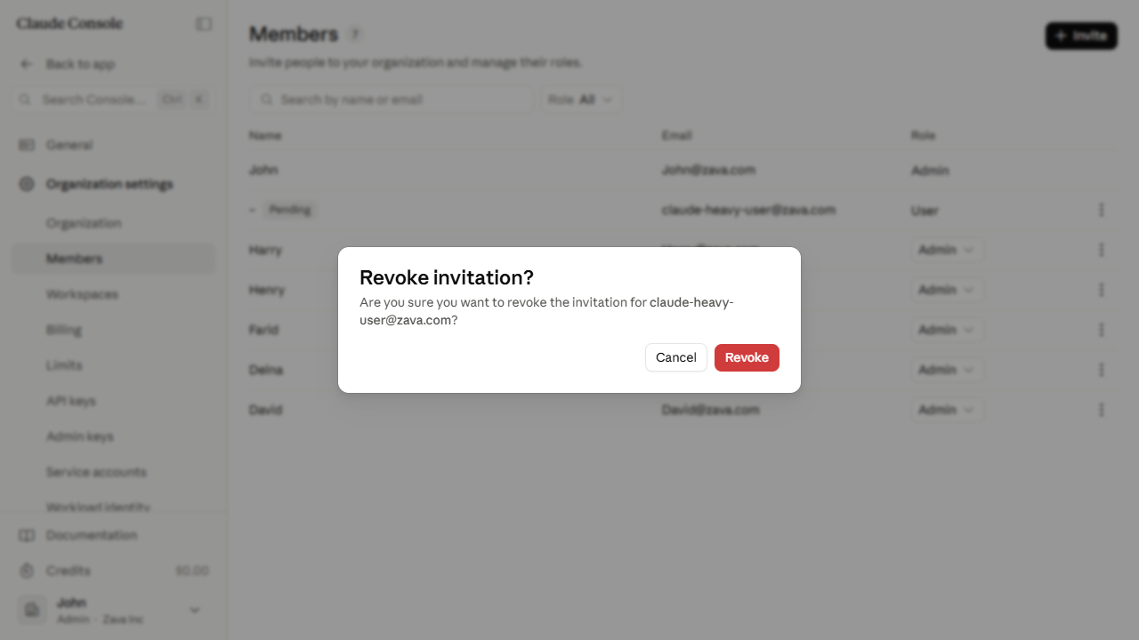 Revoke invitation dialog showing the invitee's email and a red Revoke button